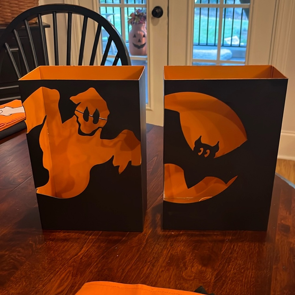 Two Halloween pumpkin, tea, light decorations